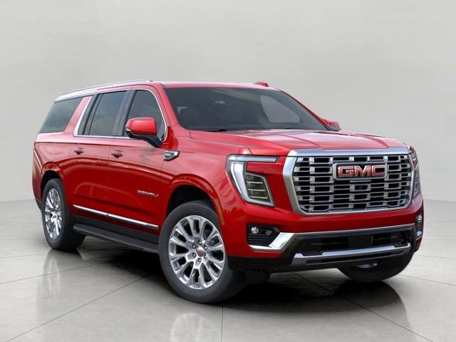2026 GMC Yukon XL Denali in Volcanic Red Tintcoat — front three-quarter view