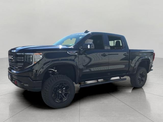 2026 GMC Sierra 1500 AT4 in Onyx Black — front three-quarter view