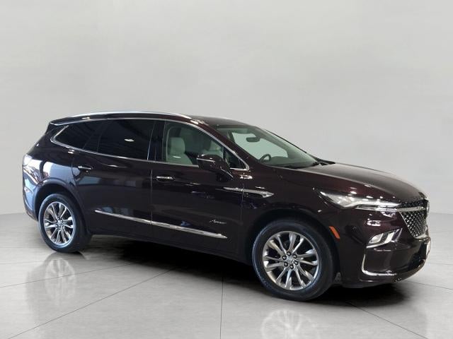 2023 Buick Enclave AWD 4dr Avenir in Rich Garnet Metallic — front three-quarter view