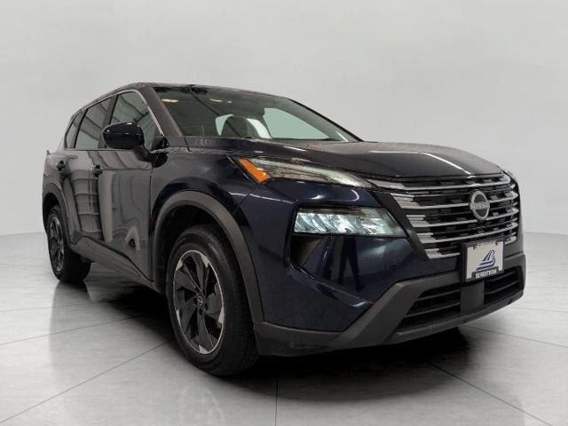 2025 Nissan Rogue AWD SV in Deep Ocean Blue Pearl — front three-quarter view